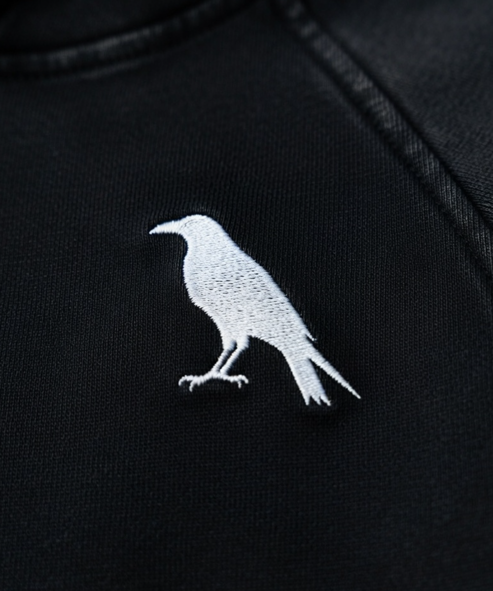 The Ash Krow mark, embroidered close